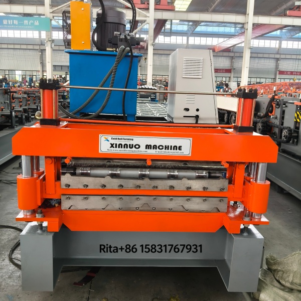 Hydraulic shear mechanism and precision guide posts ensuring clean cuts and consistent panel alignment during high-speed operation