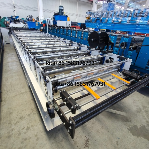 Rear view of metal glazed tile roll forming machine showing precision roller stations and transmission system
