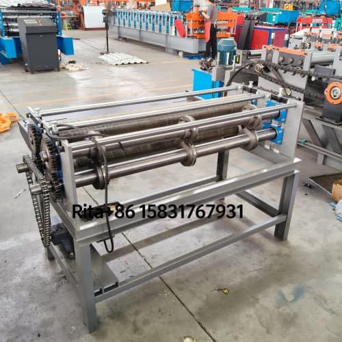 Slitting machine left side view showing material feeding system and guide rollers